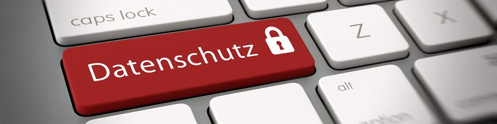 Fotomontage einer Laptoptastatur, bei der auf einer Taste "Datenschutz" geschrieben steht.